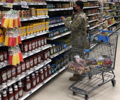 A soldier shops in the commissary Thumbnail