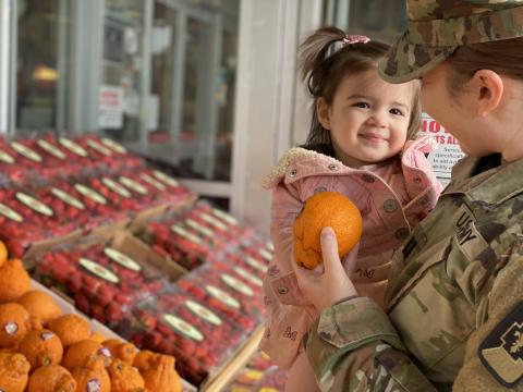 Capt. Meno with her daughter in commissary department Thumbnail