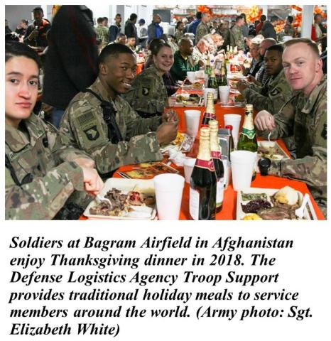 Soldiers eat a holiday meal in Afghanistan