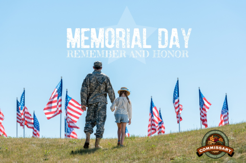 military member and child walking up hill with American flags with text that states Memorial Day, Remember and Honor